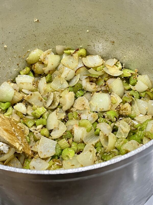 the beginning of the soup process - onions, celery, herbs, spices, starting that flavour base